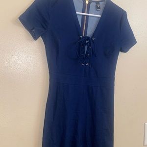 Denim short sleeved jumpsuit from Windsor. Gold zipper back.